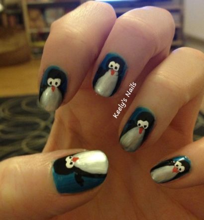 Freehand cute penguin nail art