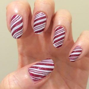 Candy Cane striped nail art on textured polish from Zoya