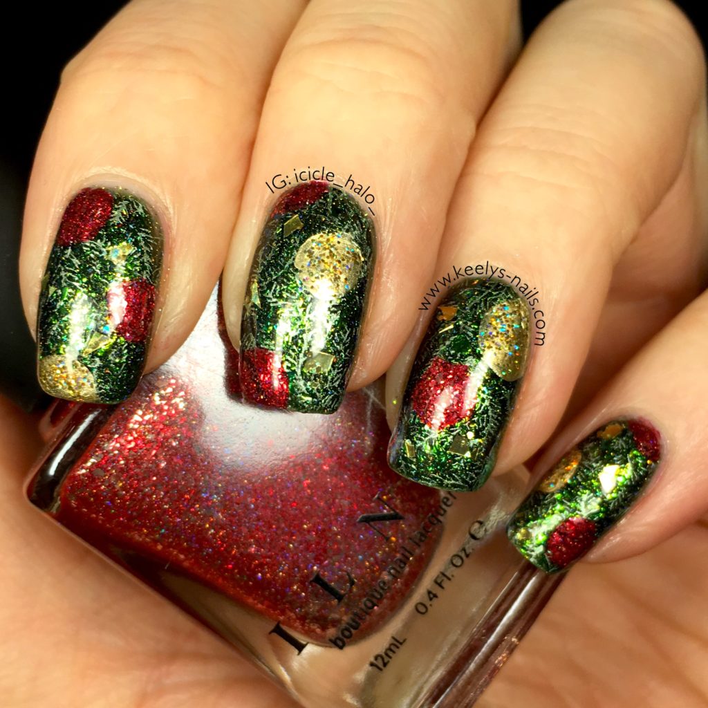 Christmas tree nail art with layers of stamping