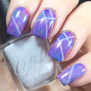 Holographic Lines - left hand with Colors by Llarowe bottle. There might be extra holo here, I can't tell.