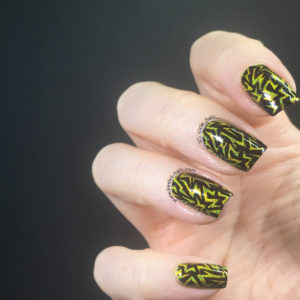Painted Polish Midnight Mischief stamped with Electric Nail Art using Pheromone