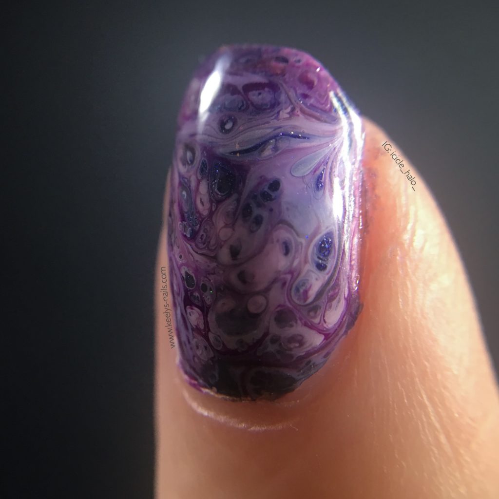 Fluid nail art - left hand index macro