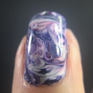 Fluid nail art - left hand ring macro - lots of cells!