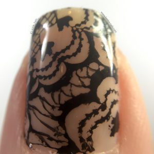 Lace nail art with Wingz - macro of stamping