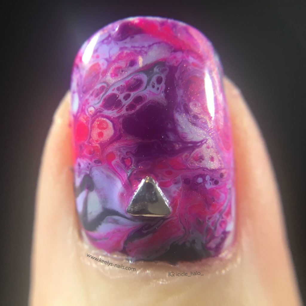 Look at all those cells! Piling the polish on a stamper creates great Fluid Nail Art.
