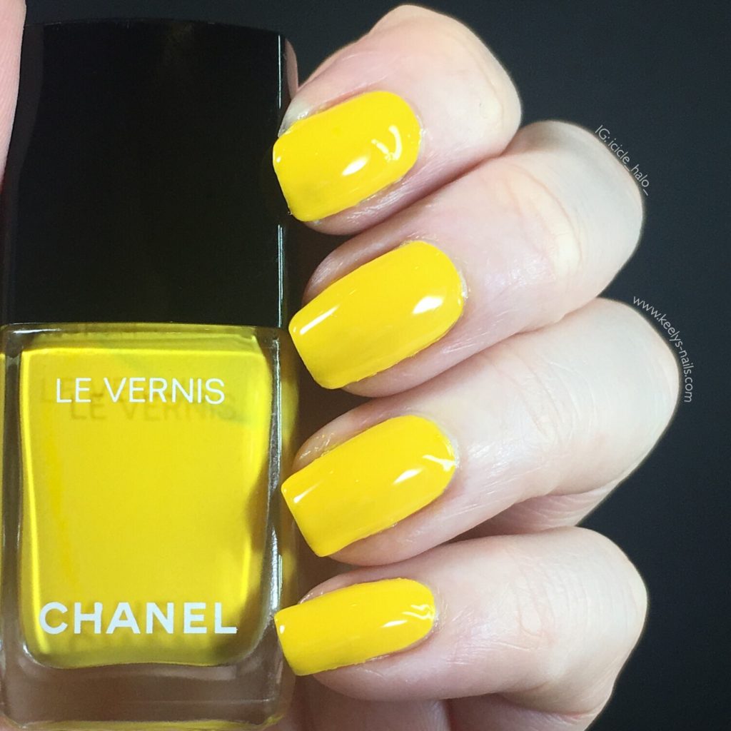 Swatch of Chanel Giallo Napoli a bright yellow polish, opaque in two coats
