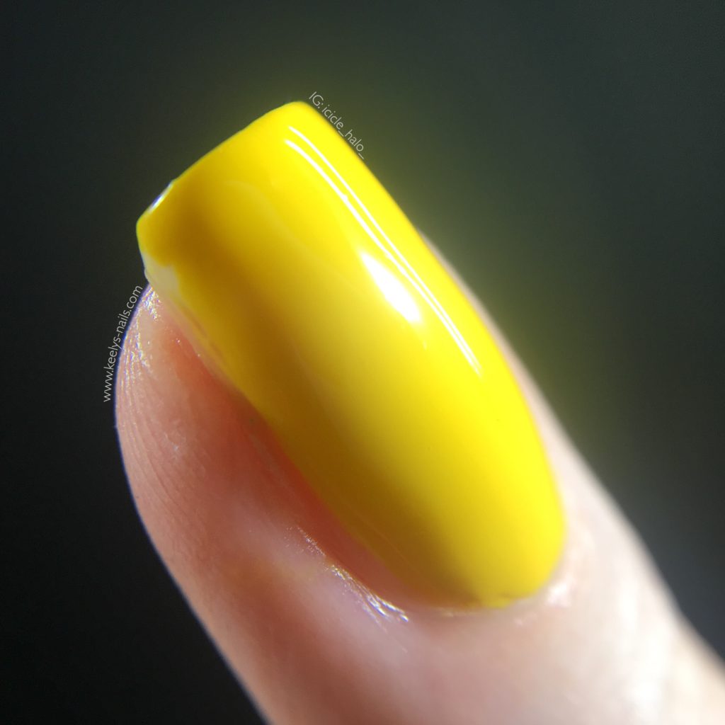 Macro photo of my swatch of Chanel Giallo Napoli - a bright yellow creme polish from the Neapolis collection 2018