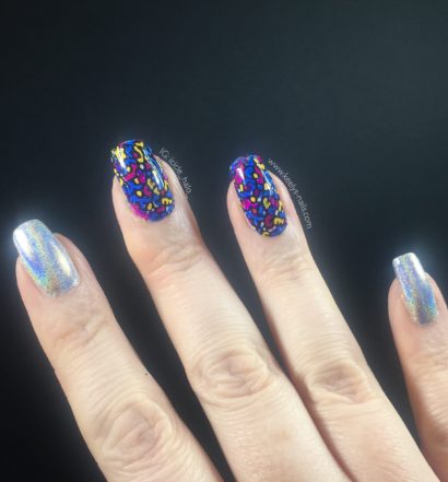 My right hand fingers with my Millefiori nail art and silver holo