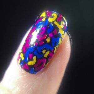 Macro photo of my reverse-stamping Millefiori nail art